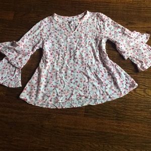 Flowy white shirt with flowers on it with keyhole